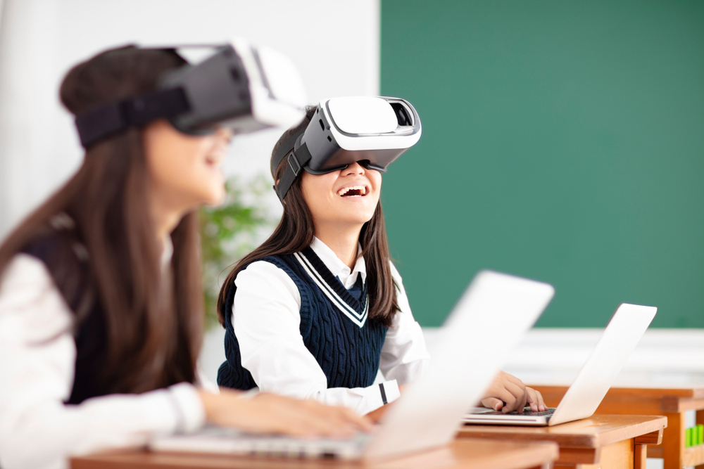 Teenagers,Student,With,Virtual,Reality,Headset,In,Classroom
